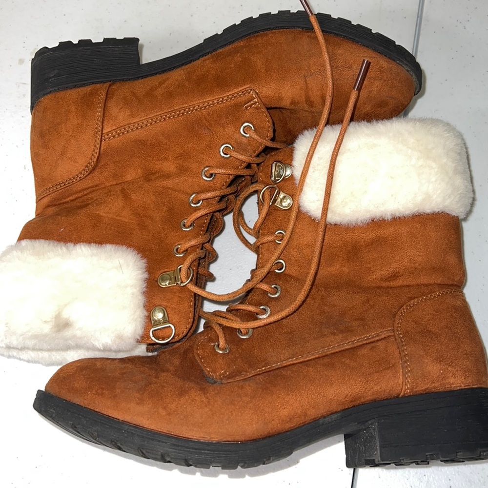 Lightly used winter combat boots with faux fur